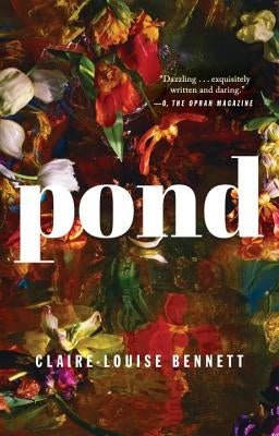 Paperback copy of the novel "Pond" by Riverhead Books, featuring the book cover with artistic pond imagery.