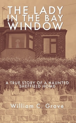 Paperback of "The Lady in the Bay Window" by Independently Published, showing the book cover with ghostly house imagery.