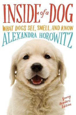 Inside of a Dog Young Readers Edition paperback book showing colorful cover art on a white background.