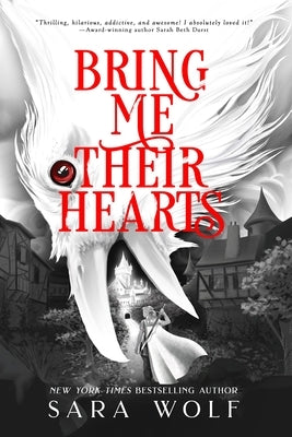 Paperback copy of "Bring Me Their Hearts" by Entangled Publishing featuring the book cover with dark fantasy artwork.