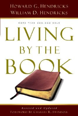 Paperback copy of Living by the Book: The Art and Science of Reading the Bible by Moody Publishers, featuring a hardcover with text on the cover.