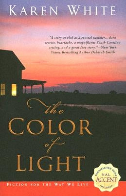 Paperback copy of The Color of Light by Berkley Books, featuring the book cover with vibrant colors and title text.