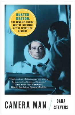 Paperback book titled "Camera Man: Buster Keaton, the Dawn of Cinema" featuring a cover image with vintage film camera and Buster Keaton illustration.