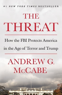 Paperback book titled "The Threat" by St. Martin's Griffin, featuring a cover with imagery related to FBI and national security.