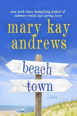 Paperback of the novel "Beach Town" by St. Martin's Griffin, featuring a beach scene cover art.