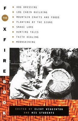 Paperback of The Foxfire Book by Anchor Books, featuring vintage illustrations of hog dressing, log cabin building, and mountain crafts.