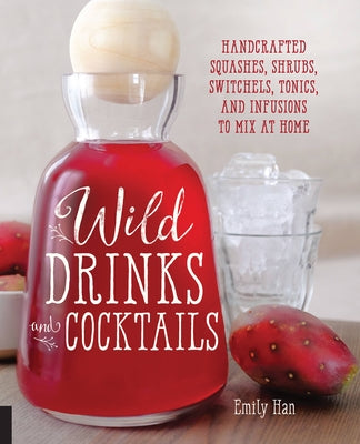 Paperback book titled "Wild Drinks & Cocktails" by Fair Winds Press, featuring colorful pages with recipes for handcrafted drink infusions.