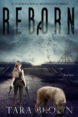 Paperback copy of "Reborn: A Post-Apocalyptic Survival Thriller" with a dark cover featuring a rugged landscape and survival imagery.