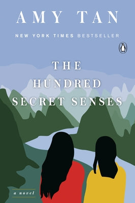Cover of "The Hundred Secret Senses" by Penguin Books, featuring artistic book cover design with vibrant colors.