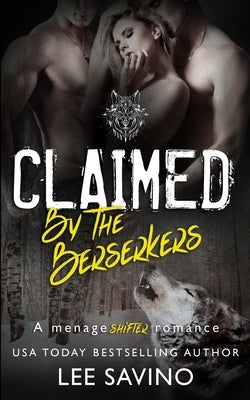 Paperback copy of "Claimed by the Berserkers," a ménage shifter romance novel published by Silverwood Press, with a detailed cover design.
