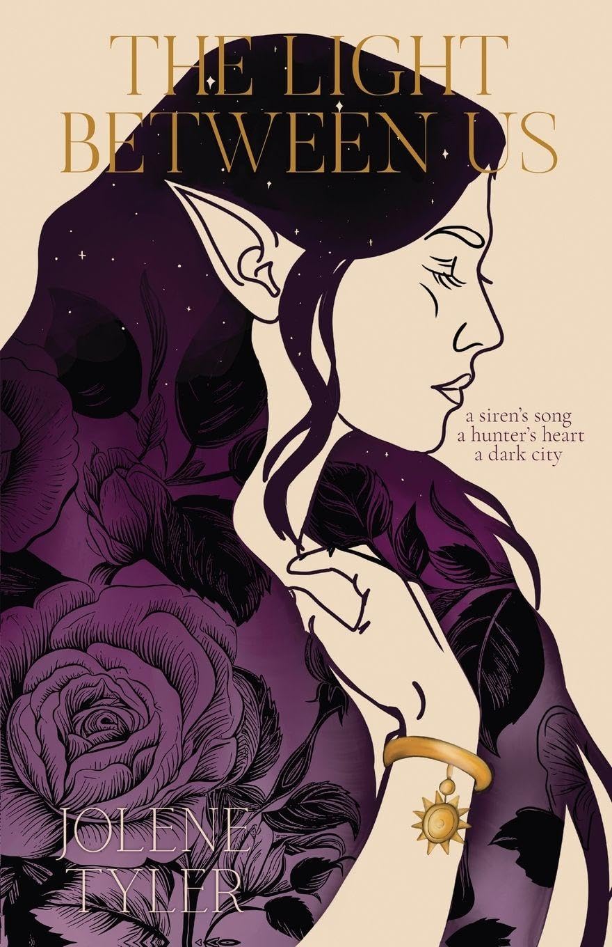 The Light Between Us book by SureShot Books Publishing LLC, front cover shown