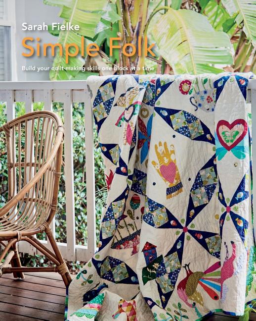 Paperback of Simple Folk Quilt Pattern book by Blurb, featuring colorful quilt designs and instructional videos on the cover.