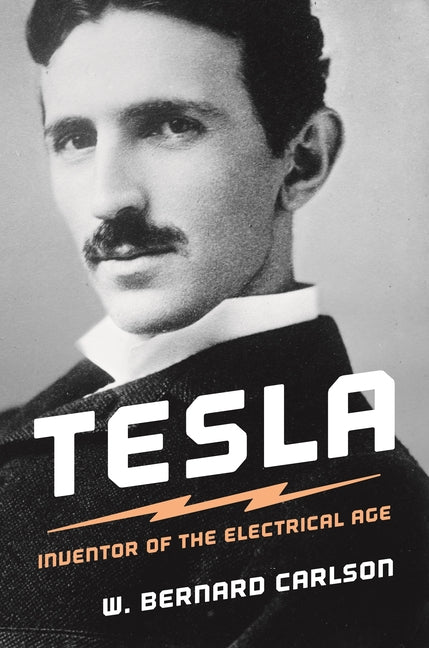 Paperback book titled "Tesla: Inventor of the Electrical Age" by Princeton University Press, showing a cover with Nikola Tesla's image.