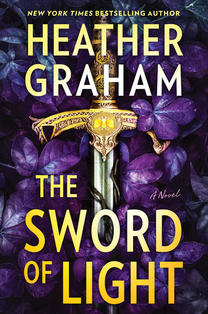 Paperback copy of The Sword of Light by Mira Books, featuring the book cover with a mystical sword illustration.