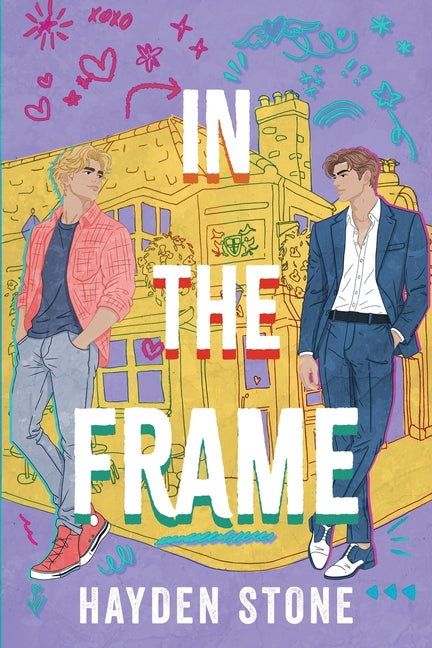 Paperback copy of "In the Frame: A Fake Dating Queer MM Romance" by Hayden Stone, featuring the book cover artwork.