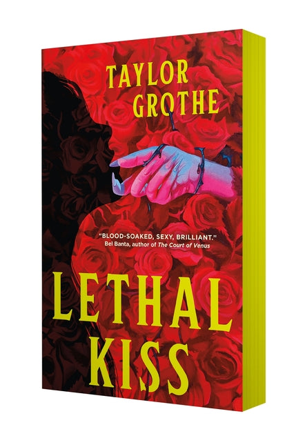 Paperback copy of "Lethal Kiss" novel by Tor Nightfire, showing the book cover with dark, dramatic artwork.