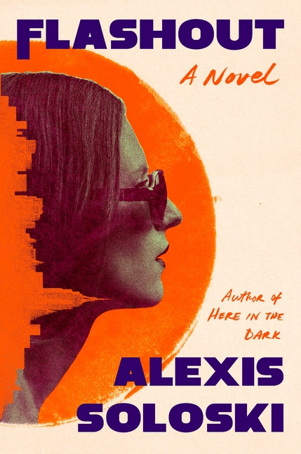 Paperback of Flashout by Flatiron Books, featuring the book cover with bold title and colorful design.