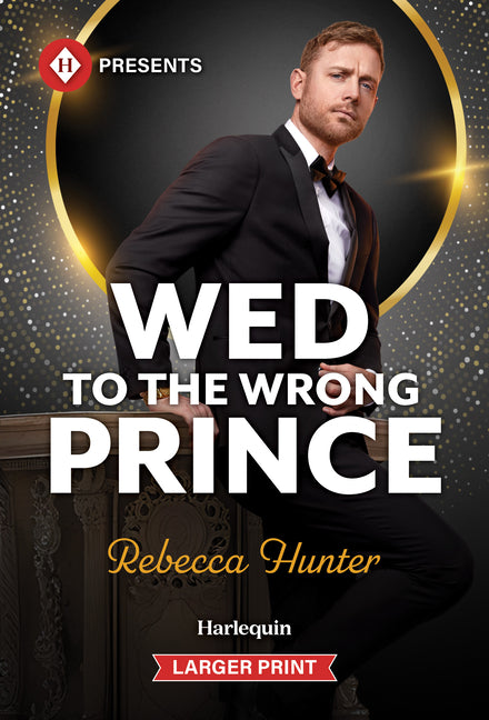 Mass market paperback of "Wed to the Wrong Prince" by Harlequin Presents Larger Print, showing the book cover and title.