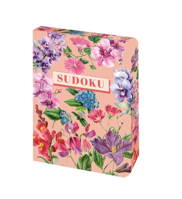 Paperback Sudoku puzzle book by Sirius Entertainment with colorful cover and sample puzzles on the front page.