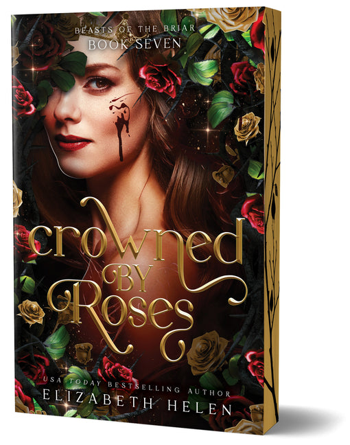 Paperback of Crowned by Roses Deluxe Edition by Bloom Books, featuring a floral cover design with roses.
