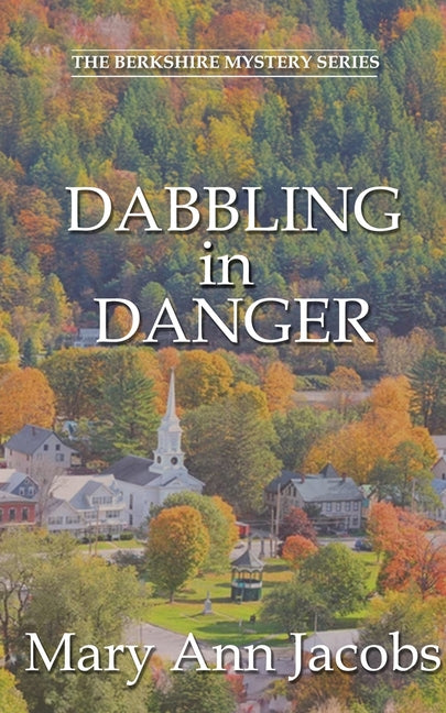 Paperback of "Dabbling in Danger" by Wild Rose Press, showing the book cover with title and author on a plain background.