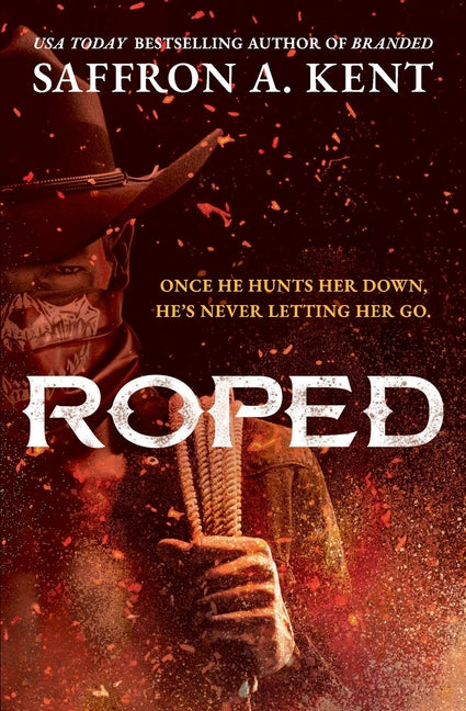 Paperback of "Roped" by Forever, featuring the book cover with title and author details.