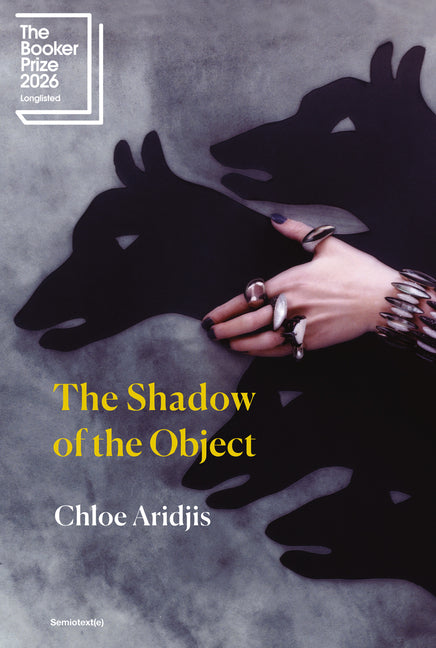 Paperback book titled "The Shadow of the Object" by Semiotext(e), showing the front cover with abstract design.