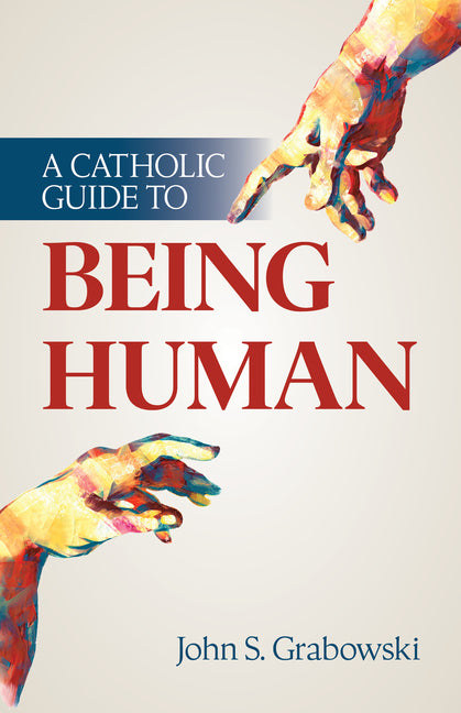 Paperback of "A Catholic Guide to Being Human" by Our Sunday Visitor, showing the book cover with religious and human themes.