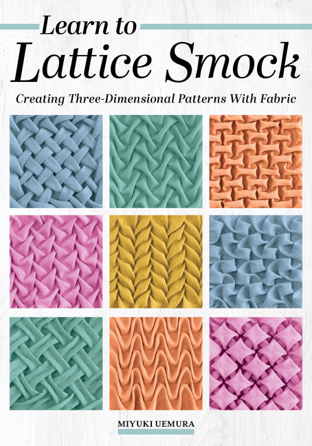 Paperback book titled "Learn to Lattice Smock" by Landauer, showing a cover with fabric pattern illustrations.