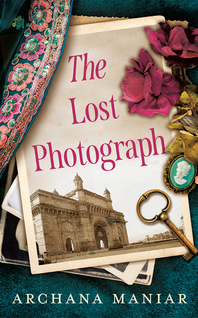 Paperback copy of The Lost Photograph by Lake Union Publishing, showing the book cover with title and author.