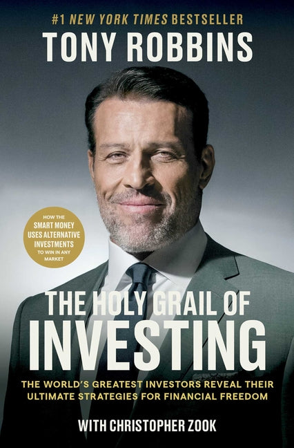 Paperback book titled "The Holy Grail of Investing" by Simon & Schuster, featuring a cover with financial and investment themes.