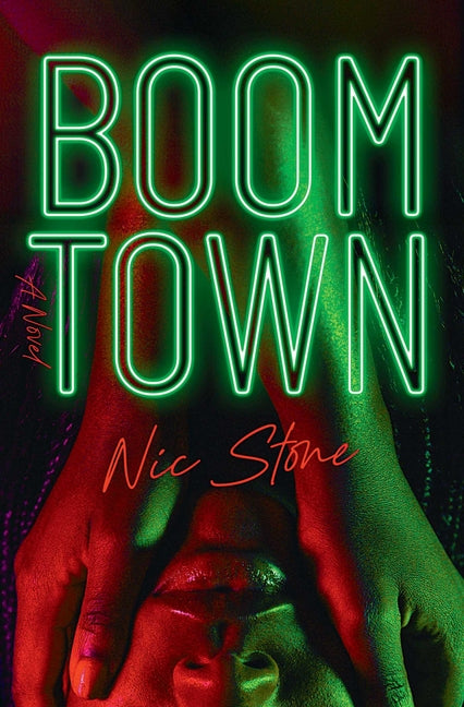 Paperback book titled "Boom Town" by Simon & Schuster, featuring a colorful cover design.