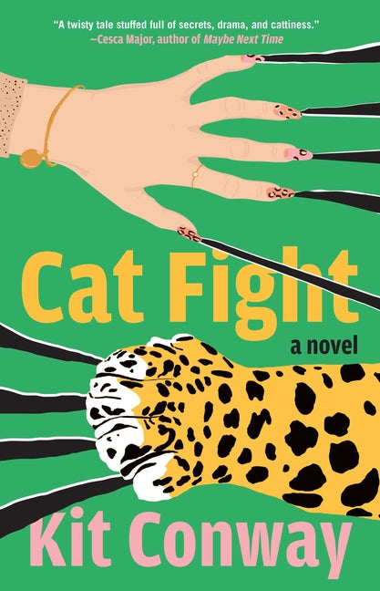Paperback of "Cat Fight" novel by Atria Books, featuring the book cover with title and author details visible.