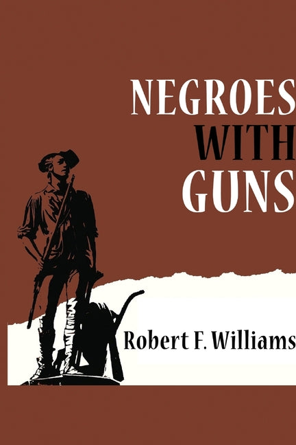 Paperback copy of "Negroes with Guns" by Blurb, featuring the book cover with bold title and author name on the front.