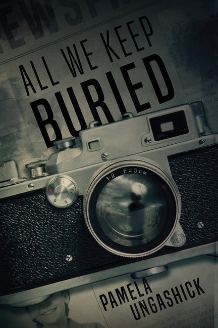 Paperback of All We Keep Buried by Red Adept Publishing, featuring the book cover with dark, moody artwork.