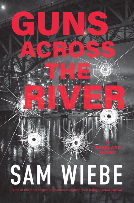 Paperback of "Guns Across the River" Wakeland novel published by Harbour Publishing, featuring the book cover with title and author.
