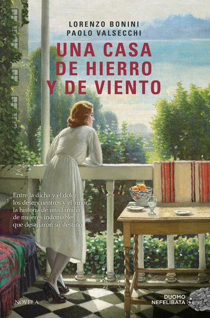 Paperback of "Una Casa de Hierro y de Viento" by Duomo Ediciones, showing the book cover with title and author details.