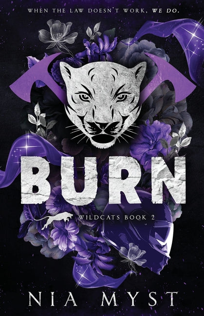 Paperback book titled "Burn" by Spice Queen Bookshop Inc., featuring a colorful cover design.