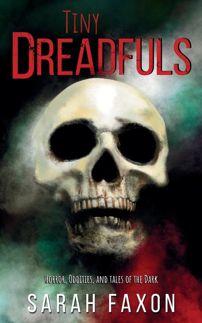 Paperback copy of Tiny Dreadfuls: Horrors, Oddities, and Tales of the Dark by Argonaut Ink, LLC, featuring dark-themed cover art.