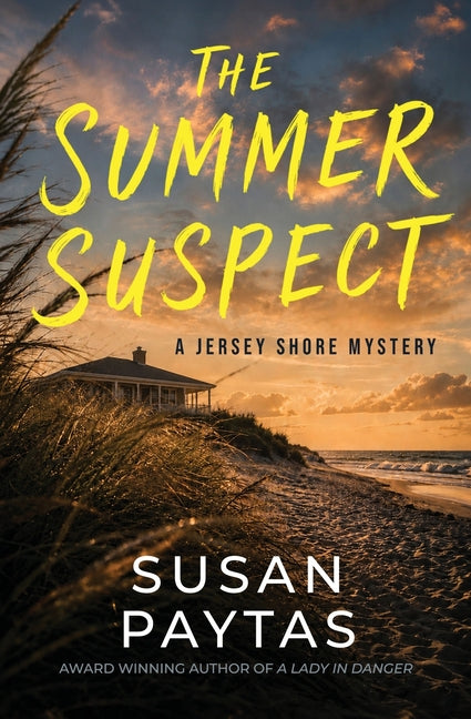 Paperback of "The Summer Suspect" by Susan Paytas, showing the book cover with title and author on a plain background.