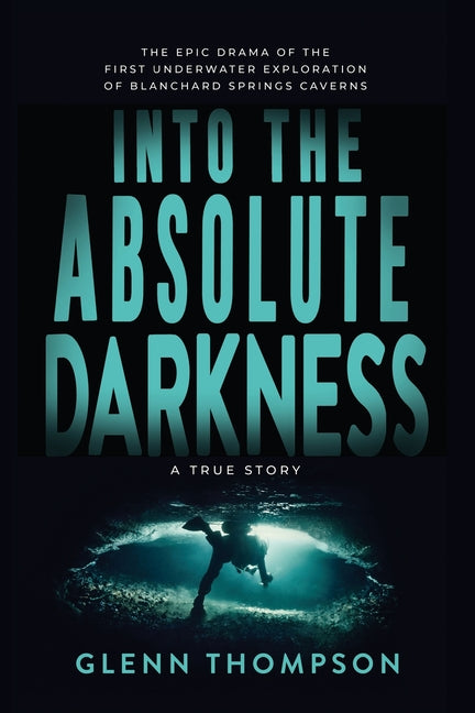 Paperback book titled "Into The Absolute Darkness" by Glenn Thompson Adventures, depicting underwater exploration of Blanchard Springs Caverns.