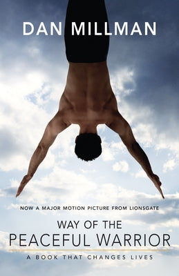 Paperback copy of "Way of the Peaceful Warrior" by Hj Kramer, showing the book's front cover with title and design elements.