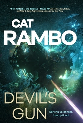 Paperback copy of "Devil's Gun" by Tor Books featuring the book cover with dark and fiery artwork.
