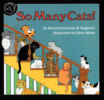 Open paperback of "So Many Cats!" by Clarion Books showing colorful cat illustrations on the cover.