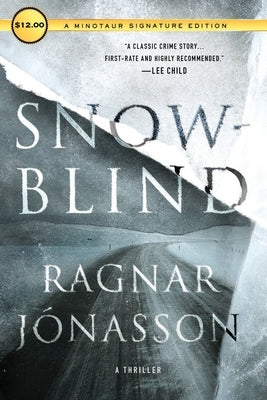 Paperback of Snowblind by Minotaur Books featuring the book cover with dark, snowy imagery and bold title text.