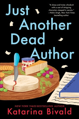 Paperback of "Just Another Dead Author" by Poisoned Pen Press, featuring the book cover with title and author details.