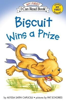 Paperback of "Biscuit Wins a Prize" by HarperCollins, featuring the book cover with colorful illustrations and title text.