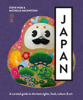 Paperback book titled "Japan: A Curated Guide" by Plum, featuring colorful cover art showcasing Japanese culture and landmarks.