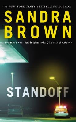 Mass market paperbound standoff book with cover design by Grand Central Publishing, featuring a close-up of the front cover.