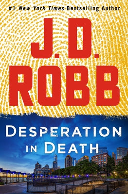 Paperback copy of "Desperation in Death" by Eve Dallas, large print edition, featuring a dark cover with urban noir artwork.
